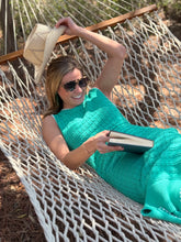 Load image into Gallery viewer, Jade knit maxi dress with white triangle detailing at all seems. Side slits and slight cap sleeve. Nude undergarments needed, slip suggested. Could be worn as a beach cover up as well.
Runs small, size up 1 size. Wearing size medium.
Good for bump, post bump or no bump!
Jade Knit Maxi Dress with White Triangle Detailing β Effortless Elegance & Versatility
Make a statement in this jade knit maxi dress, designed for a perfect blend of boho charm and modern sophistication. Featuring white triangle deta