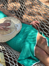 Load image into Gallery viewer, Jade knit maxi dress with white triangle detailing at all seems. Side slits and slight cap sleeve. Nude undergarments needed, slip suggested. Could be worn as a beach cover up as well.
Runs small, size up 1 size. Wearing size medium.
Good for bump, post bump or no bump!
Jade Knit Maxi Dress with White Triangle Detailing β Effortless Elegance & Versatility
Make a statement in this jade knit maxi dress, designed for a perfect blend of boho charm and modern sophistication. Featuring white triangle deta