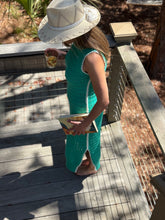 Load image into Gallery viewer, Jade knit maxi dress with white triangle detailing at all seems. Side slits and slight cap sleeve. Nude undergarments needed, slip suggested. Could be worn as a beach cover up as well.
Runs small, size up 1 size. Wearing size medium.
Good for bump, post bump or no bump!
Jade Knit Maxi Dress with White Triangle Detailing β Effortless Elegance & Versatility
Make a statement in this jade knit maxi dress, designed for a perfect blend of boho charm and modern sophistication. Featuring white triangle deta