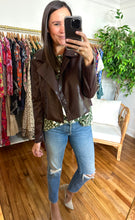Load image into Gallery viewer, Brunette vegan leather jacket. Cropped to waistline and zipper front closure.  True to size, wearing size small.
