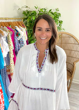 Load image into Gallery viewer, Off white mini dress with embroidered detailing and tassel edging. Drop shoulder detailing and drop hemline. Gauze cotton blend. Slip needed as dress, can be worn as cover up. Fits roomy but true to size, wearing size small. Good for bump, post bump or no bump! Great length for moms. Model's True to Size