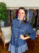 Load image into Gallery viewer, Navy and light blue paisley printed mini dress with block print contrasting skirt. Functional front buttons, long sleeves and drop ruffle waistline.  True to size, wearing size small.  Good for bump, post bump or no bump!
