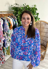 Load image into Gallery viewer, Blue, pink, red and white floral blouse with split neck and balloon long sleeves. Bodice lined and sleeves sheer. Chiffon and cotton blend. Covers most of front and rear.  True to size, wearing size x-small.
