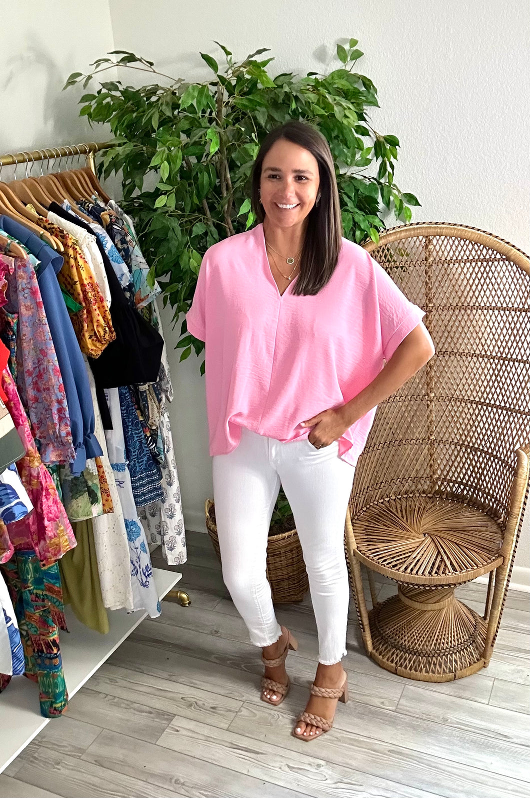 Classic oversized v-neck blouse with dolman sleeves in light pink. Poly silk blend. Covers most of front and rear fully.  Fits roomy, wearing size small.