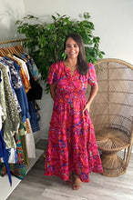 Load image into Gallery viewer, Palmer maxi dress in raveena floral print. Tiered skirt with pockets, split neckline, smocked waistline and flyaway sleeves. Cotton poplin.  True to size, wearing size x-small.
