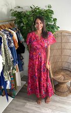 Load image into Gallery viewer, Palmer maxi dress in raveena floral print. Tiered skirt with pockets, split neckline, smocked waistline and flyaway sleeves. Cotton poplin.  True to size, wearing size x-small.
