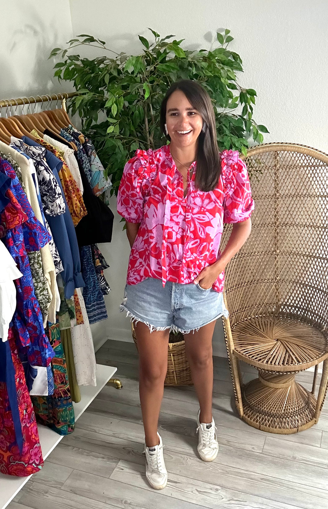 Noche tie neck blouse in marida floral print. Ruched detailing at shoulder and balloon sleeves. Covers most of front and rear. Cotton poplin.  Wearing size x-small. If between sizes, size down one size.