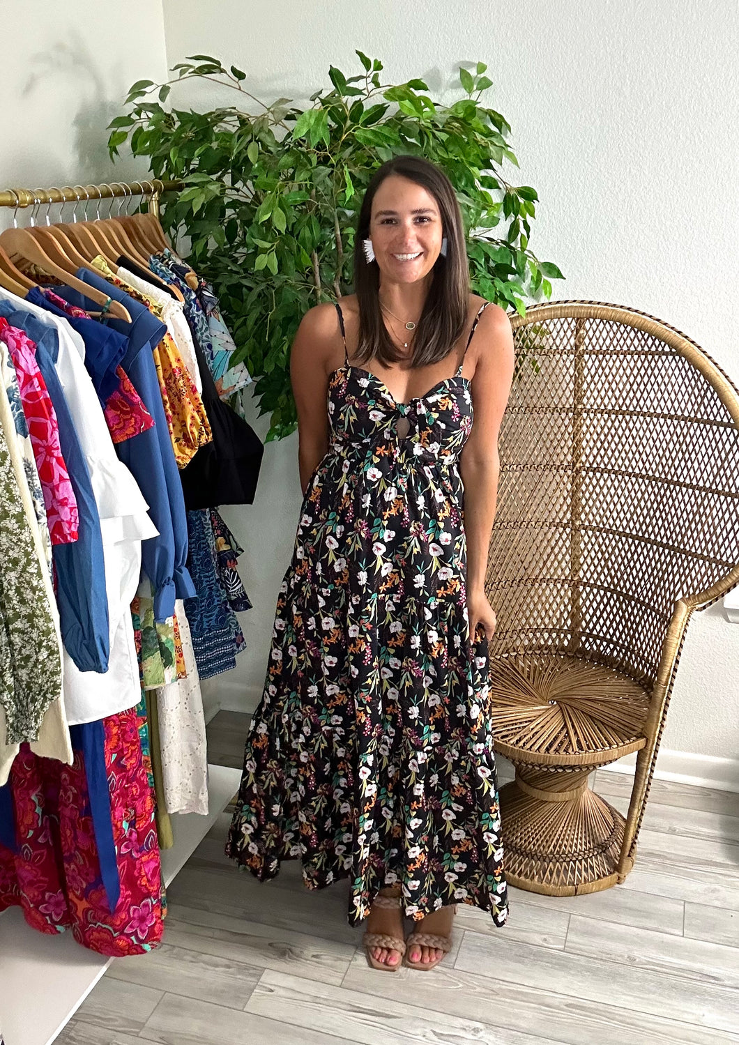 Black floral printed ankle dress. Tiered skirt, sweetheart neckline with faux tie in middle. Removable straps for a strapless look. Back zipper closure with part smocking for stretch. Cotton and double lined to the knee.  True to size, wearing size small.  Good for bump, post bump or no bump.