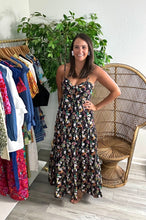 Load image into Gallery viewer, Black floral printed ankle dress. Tiered skirt, sweetheart neckline with faux tie in middle. Removable straps for a strapless look. Back zipper closure with part smocking for stretch. Cotton and double lined to the knee.  True to size, wearing size small.  Good for bump, post bump or no bump.
