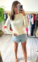 Load image into Gallery viewer, Taupe sweater with light blue stripes on the bodice and red hearts on the elbows. Light weight cotton sweater. Covers some of rear and frontside.  True to size, wearing size small.

