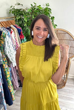 Load image into Gallery viewer, Chartreuse ankle dress with double pleated exaggerated shouldering. Smocked yoke, ruffle neckline and tiered skirt with pockets from empire waist. Poly silk and cotton poplin blend. Keyhole back closure and elastic at waist.  Fits roomy, wearing size small. If between sizes, size down.  Good for bump, post bump or no bump!
