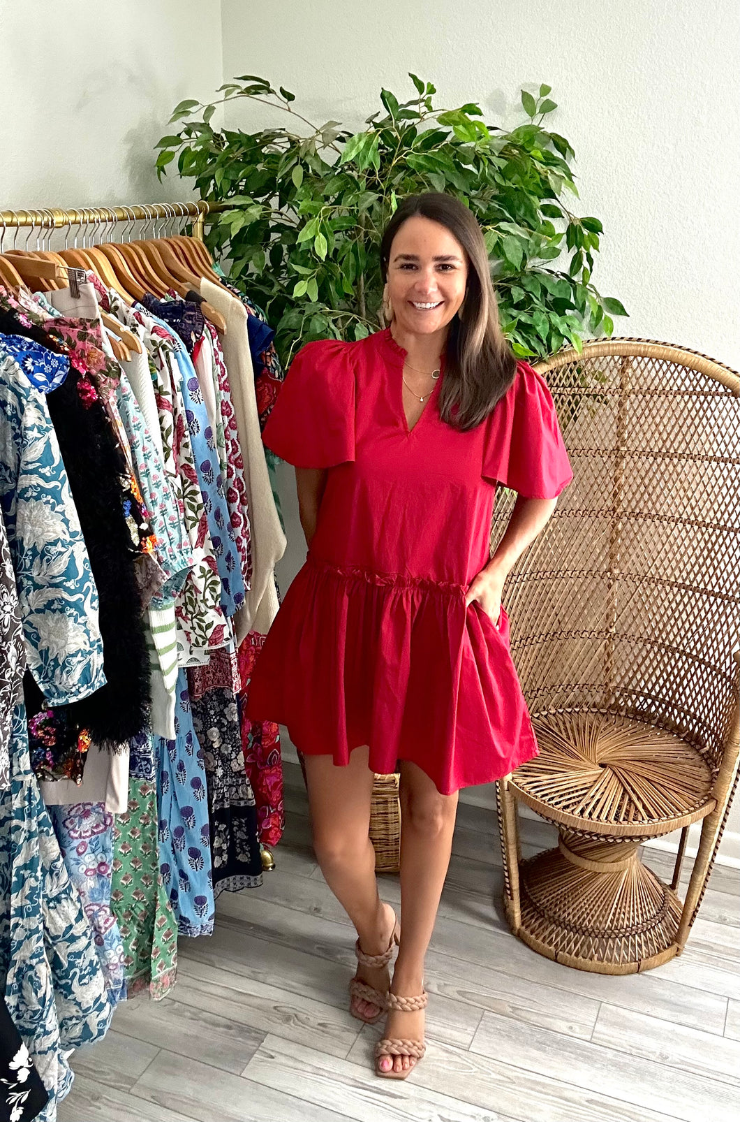 Rock a By Trapeze mini dress in cherry. Flutter sleeves with modest v-neck. Gathered high low skirt with pockets. Light weight cotton poplin.  True to size, wearing size x-small.