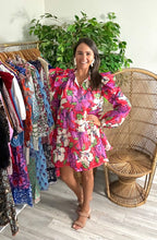 Load image into Gallery viewer, Floral printed mini dress with double ruffle fly away sleeves. Front optional tie closure at neck, long sleeves under ruffle fly away sleeves and tiered skirt. Poly silk with organza overlay.  True to size, wearing size small.  Good for bump, post bump or no bump!
