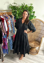 Load image into Gallery viewer, Black midi dress with balloon sleeves and tiered skirt. Poplin cotton blend, light weight. Modest v-neck.  True to size, fits roomy, wearing size small.  Good for bump, post bump or no bump!

