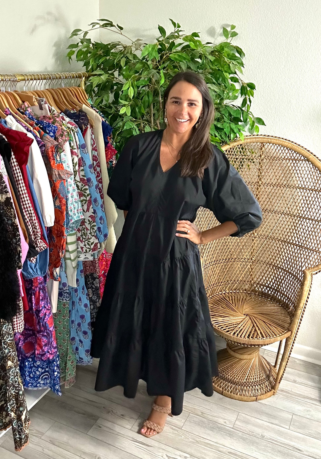 Black midi dress with balloon sleeves and tiered skirt. Poplin cotton blend, light weight. Modest v-neck.  True to size, fits roomy, wearing size small.  Good for bump, post bump or no bump!