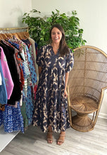 Load image into Gallery viewer, Dana dress in midnight print. Modest v-neck, puff sleeves and tiered skirt. Removable tie at waist. Light weight cotton, perfect for fall in the south. Slip suggested.  True to size, wearing size x-small.  Good for bump, post bump or no bump!

