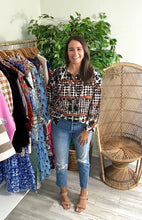 Load image into Gallery viewer, Edith blouse in deco print. Open neckline, functional front buttons and button shirt wrists. Front tassel tie closure. Covers most of front and rear. Light weight cotton.  True to size, wearing size medium, would need a small.
