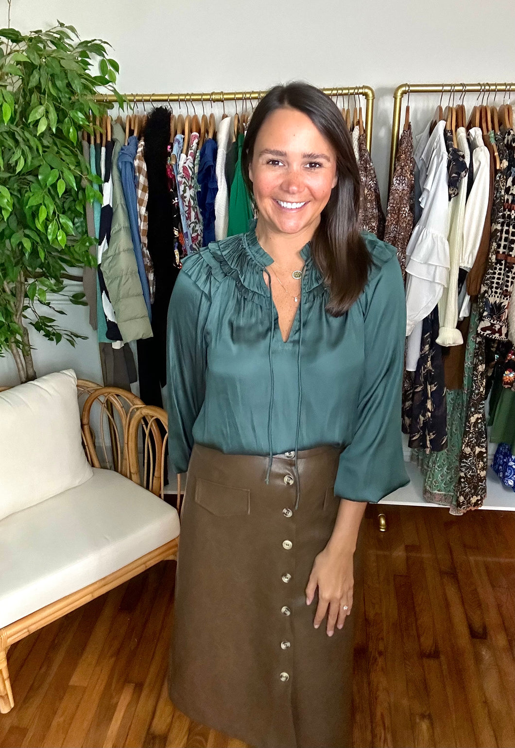 Forest green silk blouse with triple ruffle neckline. Front tie closure. Silk blend. Covers most of frontside and backside.  True to size, wearing size x-small.