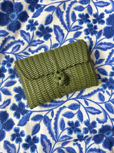Load image into Gallery viewer, Olive woven clutch with front knot closure. Woven plastic, perfect for spring and summer.
