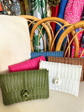Load image into Gallery viewer, White woven clutch with front knot closure. Woven plastic, perfect for spring and summer.
