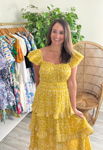 Load image into Gallery viewer, Dita midi dress in cassia print. Golden mustard and white printed cotton midi dress with double flutter sleeves, empire ruched waistline and triple tiered ruffle skirt. Ankle length. Bra strap friendly.  True to size, wearing size x-small.  Good for small bump, post bump or no bump.
