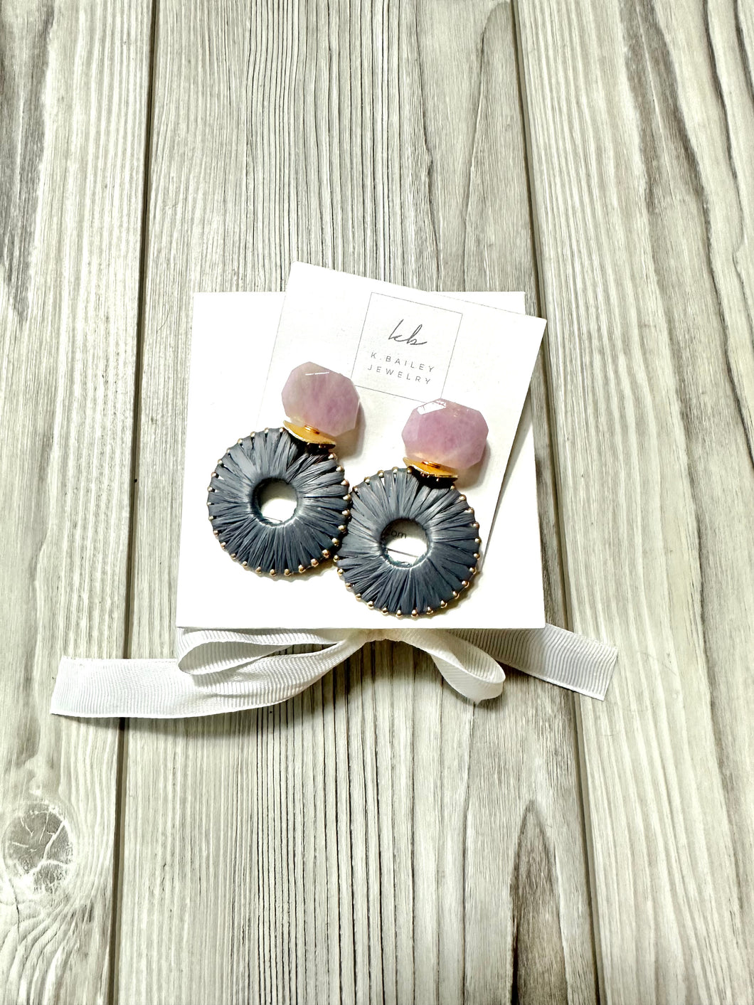 K.Bailey custom made earrings. Blush stone with post and raffia wrapped light grey pendants.
