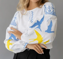 Load image into Gallery viewer, &lt;p&gt;Boho bird blouse with drop elbow balloon sleeves and crew neck. Embroidered birds and aztec pattern with faux front tie. Covers most of front and backside. Light weight cotton-linen blend.&lt;/p&gt; &lt;p&gt;True to size, wearing size small.&lt;/p&gt;

