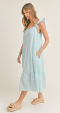 Load image into Gallery viewer, &lt;p&gt;Aqua and white seersucker midi dress. Tiered bodice with ruffle detailing on straps. Light weight cotton and lined.&lt;/p&gt; &lt;p&gt;True to size, wearing size small.&lt;/p&gt; &lt;p&gt;Good for bump, post bump or no bump!&lt;/p&gt;
