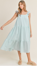 Load image into Gallery viewer, &lt;p&gt;Aqua and white seersucker midi dress. Tiered bodice with ruffle detailing on straps. Light weight cotton and lined.&lt;/p&gt; &lt;p&gt;True to size, wearing size small.&lt;/p&gt; &lt;p&gt;Good for bump, post bump or no bump!&lt;/p&gt;&lt;p&gt;Aqua and white seersucker midi dress. Tiered bodice with ruffle detailing on straps. Light weight cotton and lined.&lt;/p&gt; &lt;p&gt;True to size, wearing size small.&lt;/p&gt; &lt;p&gt;Good for bump, post bump or no bump!&lt;/p&gt;
