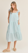 Load image into Gallery viewer, &lt;p&gt;Aqua and white seersucker midi dress. Tiered bodice with ruffle detailing on straps. Light weight cotton and lined.&lt;/p&gt; &lt;p&gt;True to size, wearing size small.&lt;/p&gt; &lt;p&gt;Good for bump, post bump or no bump!&lt;/p&gt;
