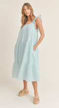 Load image into Gallery viewer, &lt;p&gt;Aqua and white seersucker midi dress. Tiered bodice with ruffle detailing on straps. Light weight cotton and lined.&lt;/p&gt; &lt;p&gt;True to size, wearing size small.&lt;/p&gt; &lt;p&gt;Good for bump, post bump or no bump!&lt;/p&gt;
