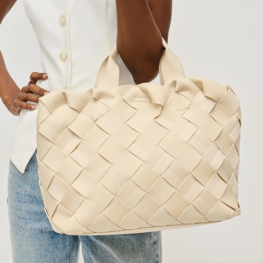 The Ruth woven neoprene ivory rectangle tote. With elbow handle and cross body removable handle. Light weight.

Stay effortlessly chic with this woven neoprene ivory rectangle tote, designed for both fashion and functionality. Crafted from lightweight yet durable neoprene, this tote features a sleek woven texture that adds a modern touch to your everyday look. The structured rectangle shape offers ample space for your essentials, while the elbow handle provides a comfortable carry option. For added versatil