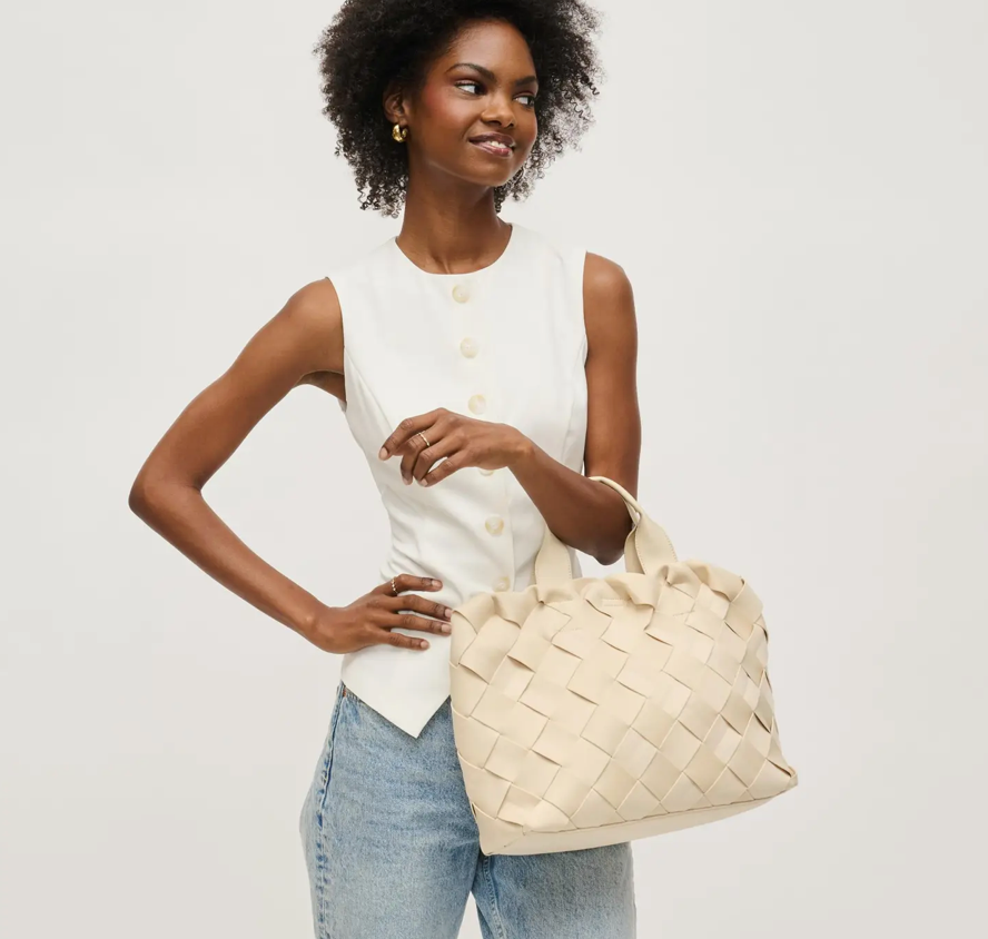 The Ruth woven neoprene ivory rectangle tote. With elbow handle and cross body removable handle. Light weight.

Stay effortlessly chic with this woven neoprene ivory rectangle tote, designed for both fashion and functionality. Crafted from lightweight yet durable neoprene, this tote features a sleek woven texture that adds a modern touch to your everyday look. The structured rectangle shape offers ample space for your essentials, while the elbow handle provides a comfortable carry option. For added versatil