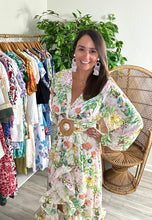 Load image into Gallery viewer, Chiffon floral print maxi dress. Snap closure throughout frontside and removable bamboo belt at waist. Wire trim to create flounce of the high-low skirt. Slit is high, slip skirt or dress suggested. Chiffon.  If between sizes, size up, wearing size small.
