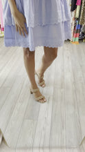 Load and play video in Gallery viewer, Powder blue swing dress with eyelet trim and double layered skirt. Front and back modest v-neck. Cotton poplin blend.  Sized up for bust, wearing size small. Usually wearing size x-small in this brand. 32C.  Good for bump, post bump or no bump!
