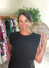 Load image into Gallery viewer, Jumpsuit with shoulder pads, elastic waist and pockets. Back keyhole closure. Silk crepe blend.  True to size, wearing size small.
