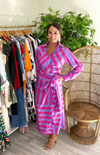 Load image into Gallery viewer, Pink and purple striped wrap dress. True wrap with shirt collar and cuffs. Poly silk blend.  True to size, wearing size small.
