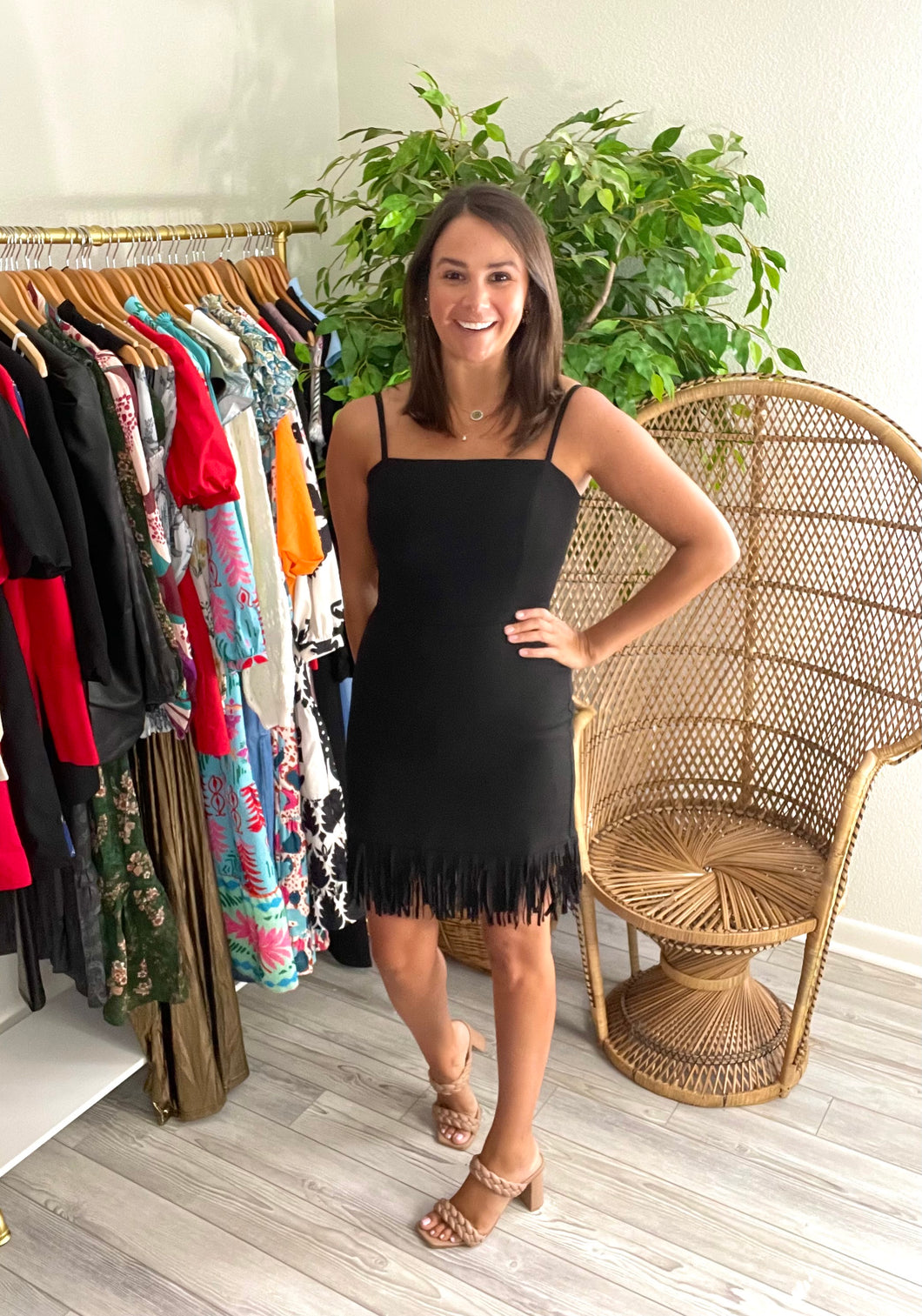 Mini skinny strap dress with double fringe hemline. Adjustable straps, elastic backside and back zipper closure. Stretch crepe.  Slim fits, true to size, wearing size small. If between sizes, size up.
