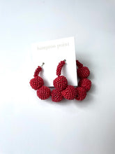Load image into Gallery viewer, Red beaded hoops.

