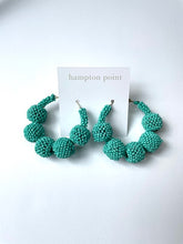 Load image into Gallery viewer, Turquoise beaded hoops.

