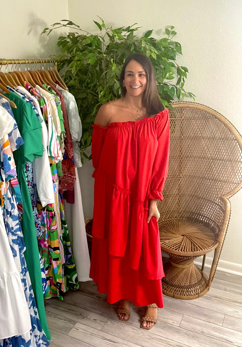 Red off shoulder ankle dress with ruffle detailing and asymmetrical layered front skirt. Poly silk and cotton blend.  True to size, meant to fit roomy, wearing size small.  Good for bump, post bump or no bump!
