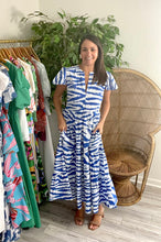 Load image into Gallery viewer, Blue and white singita print ankle dress. Flutter sleeves and tiered skirt with pockets. Light weight cotton.   If bustier, size up, wearing size x-small.  Good for bump, post bump or no bump!   
