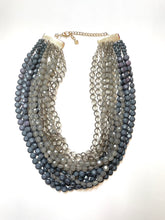 Load image into Gallery viewer, Gray ombre multi strand flat beaded bib necklace.
