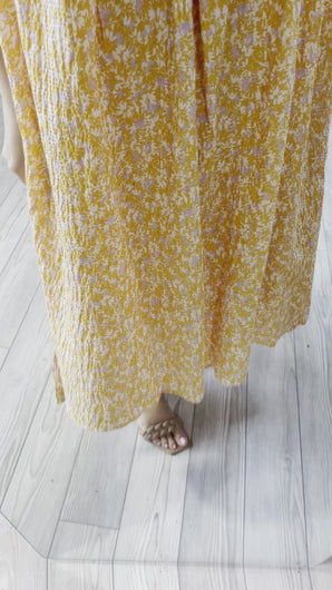Orange floral tank dress with ruched straps and square neckline. Gauze cotton blend with high low hemline.  Fits roomy, wearing size small.  Good for bump, post bump or no bump!