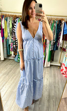 Load image into Gallery viewer, Blue and white thin striped maxi dress. Button front and tiered ruffle detailing throughout skirt. Fashion tape NOT needed. Back mirrors frontside. Poly silk blend.   True to size, wearing size small.  Good for bump, post bump or no bump!  Could be worn as a coverup

