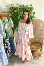 Load image into Gallery viewer, Smocked off shoulder midi dress with striped multi colored pattern. Tiered dress. Poly silk blend. Can be worn on or off the should.  Runs roomy, wearing size small.  Good for bump, post bump or no bump!
