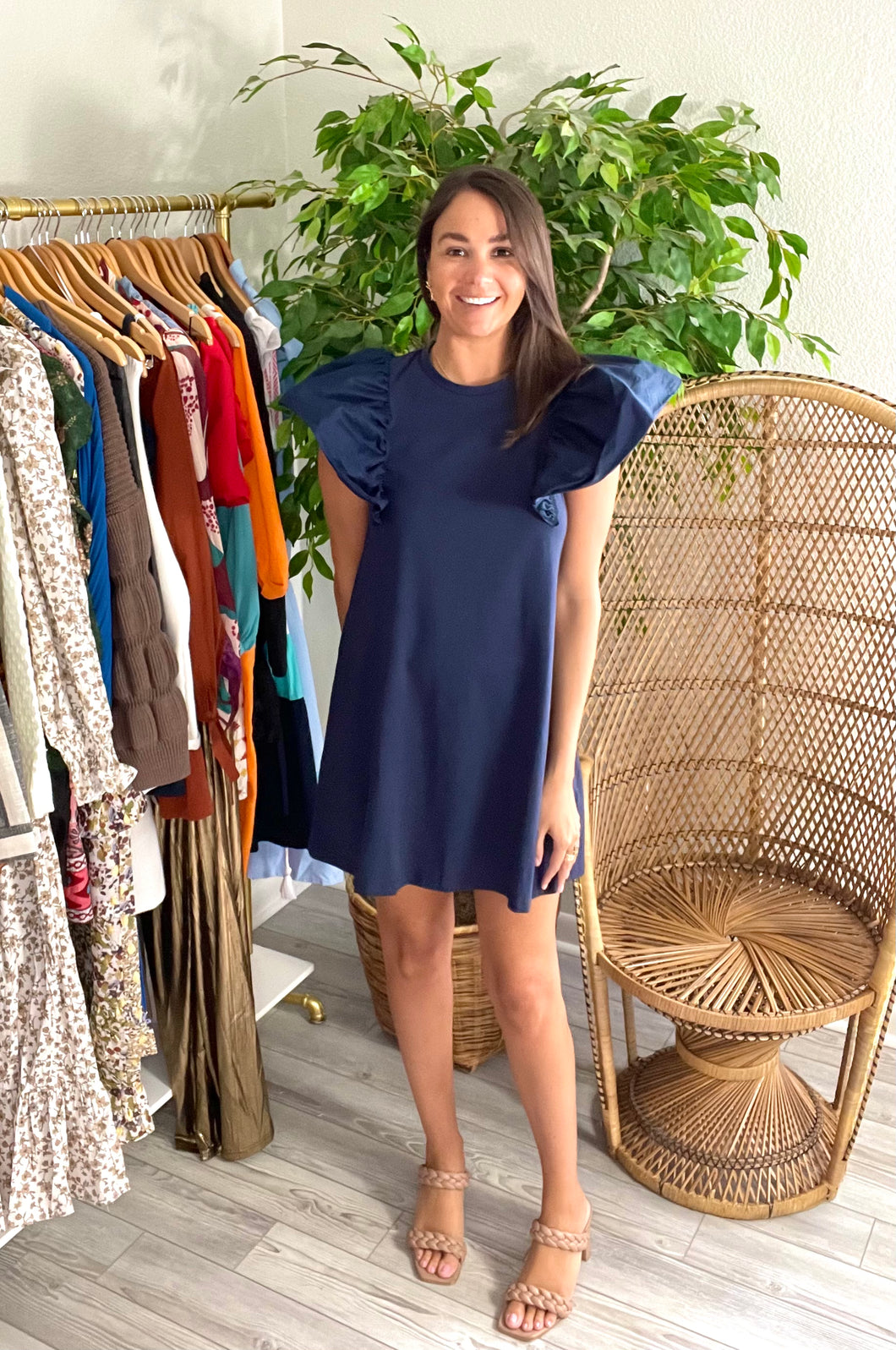 Navy t-shirt dress with dramatic flounced poplin cotton sleeves.   True to size, wearing size small. 5'5 - size up for length.