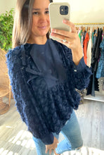 Load image into Gallery viewer, Navy blouse with fringe floral design. Poplin yoke with double tie and poplin cluffs.  True to size, wearing size x-small.
